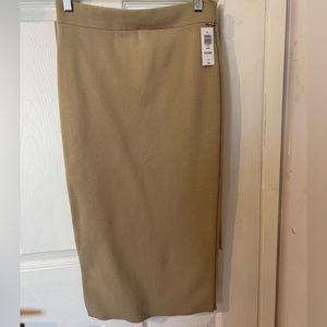 Never worn tags on Babaton midi skirt size M colour sierra beige.